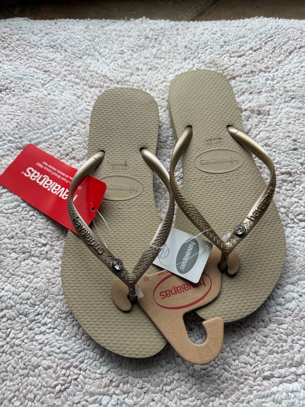 New with Tags Havaianas Sand Grey/Light Golden 
7/8 W